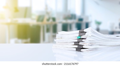 stack of reporting paper documents on a business table in the office, business documents for annual reports. Business analytics. Business office concept, soft focus. High quality photo