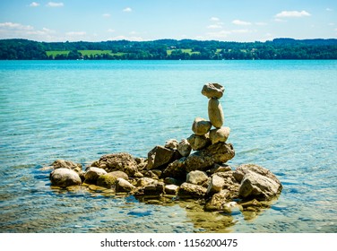 stack rocks at a lake