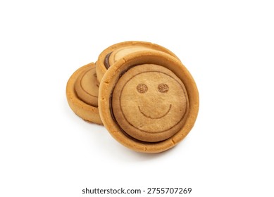 Stack of round cookies with funny winking face emoticon and chocolate cream filling, isolated on white background.