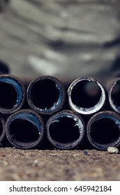 Stack of rusty metal pipes , Rusty pipes.
