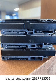Stack of SATA Hard Disk Drives Showing Data and Power Connectors