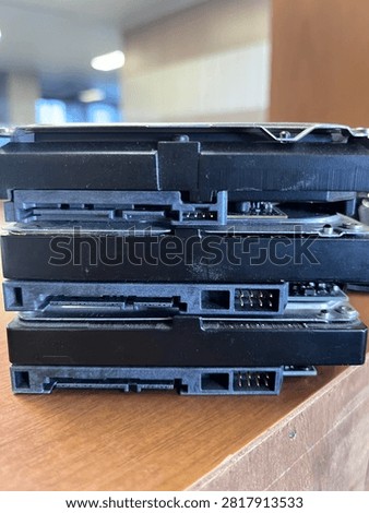 Stack of SATA Hard Disk Drives Showing Data and Power Connectors