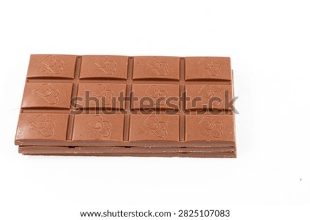 Stack of Segmented Milk Chocolate Bars for Sweet Dessert and Confectionery Concept