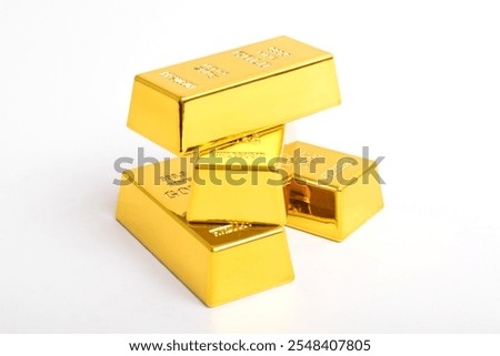 Stack of shiny gold bars isolated on white background