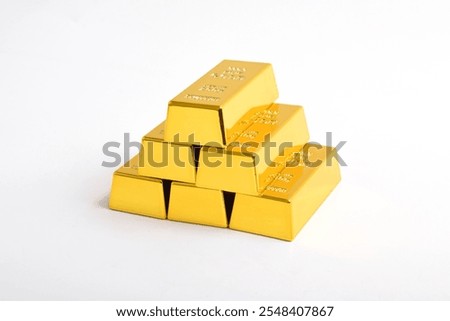Stack of shiny gold bars isolated on white background