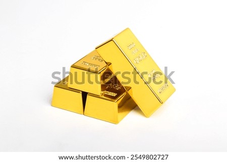 Stack of shiny gold bars isolated on white background