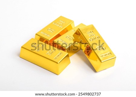 Stack of shiny gold bars isolated on white background