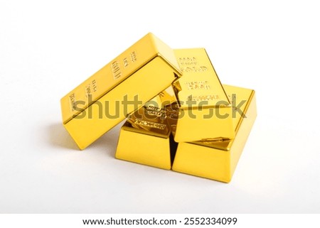 Stack of shiny gold bars isolated on white background