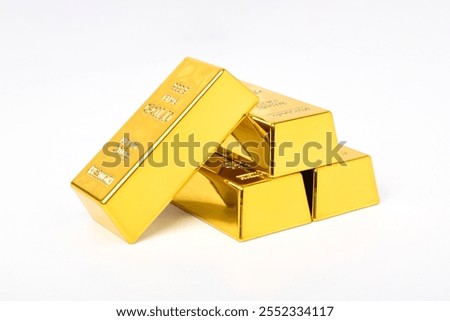 Stack of shiny gold bars isolated on white background