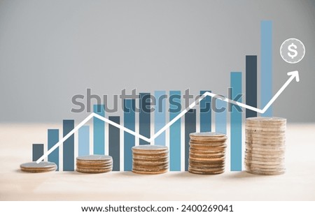 Stack of silver coins aligns with an ascending trading chart arrow, epitomizing financial concepts and investment in business stock growth. Technology leaps further this narrative. money saving graph Stock photo © 