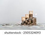 Stack of silver coins with up arrow. Finance concept increase interest rate or dividend investment mortgage. Stock market chart for bank. Business growth, profit, long term investment.