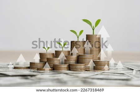 stack of silver coins with the chart in Passive income financial concept and financial investment business stock growth. finance freedom concept. 