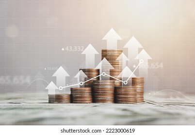 stack of silver coins with trading chart in financial concepts and financial investment business stock growth - Shutterstock ID 2223000619