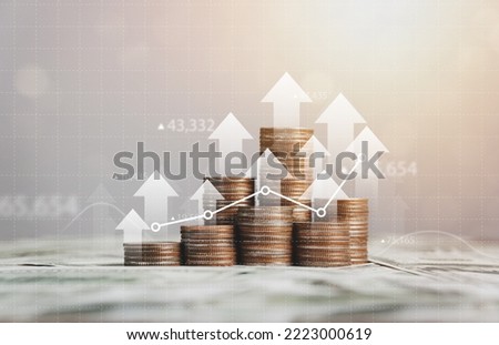 stack of silver coins with trading chart in financial concepts and financial investment business stock growth Stock foto © 