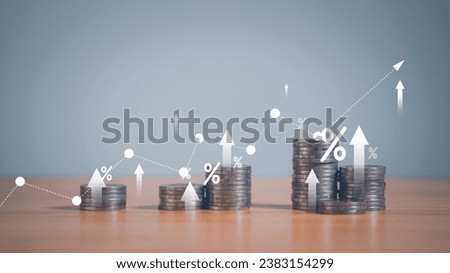 stack of silver coins with trading chart in financial concepts and financial investment business stock growth, for financial banking increase interest rate.