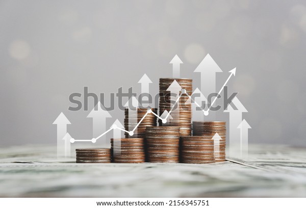 stack of\
silver coins with trading chart in financial concepts and financial\
investment business stock\
growth