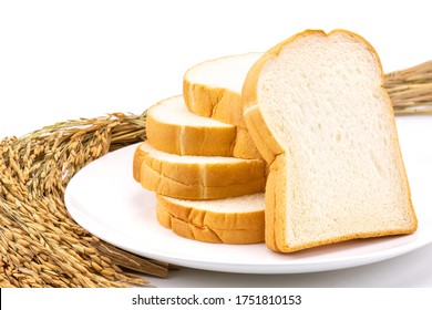 Stack Of Slice Bread In White Round Plate Decorated With Paddy Rice Isolated On White Background