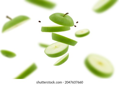 Stack Of Sliced Green Apple Flying Or Falling.Creative Levitation Food.
