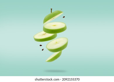 Stack Of Sliced Green Apple Flying Or Falling.Creative Levitation Food.
