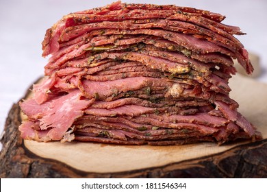 stack of sliced pastrami meat