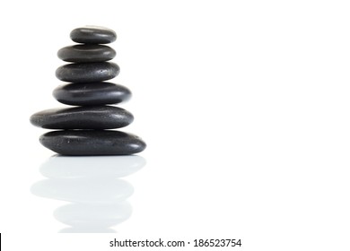 Stack Of Spa Hot Stones Isolated On White Background