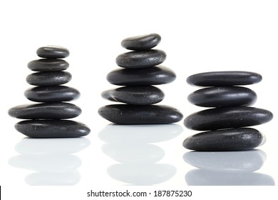 Stack Of Spa Hot Stones Isolated On White Background