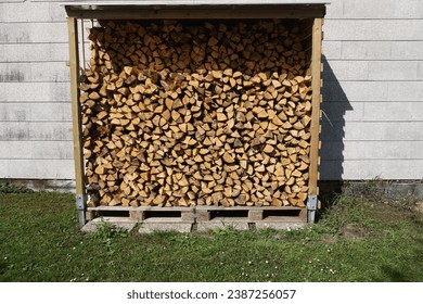 Stack of split wood for the winter                     
