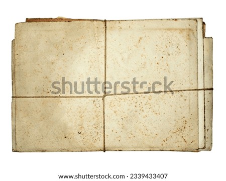Stack of stained dirty old antique letters, tied with cord isolated on white background. Use a historic typeface and add some text to create something unique.