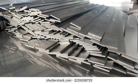 Stack of stainless steel flat bar of background.  - Shutterstock ID 2235038733