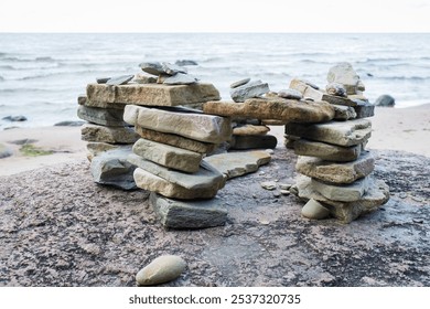 Stack of stones on a beach. Stacking rocks to make dreams come true. Make a wish.