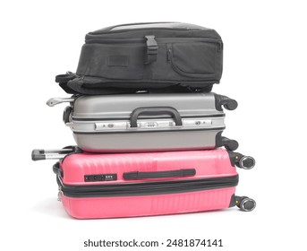 Stack of suitcases and backpack isolated on white background