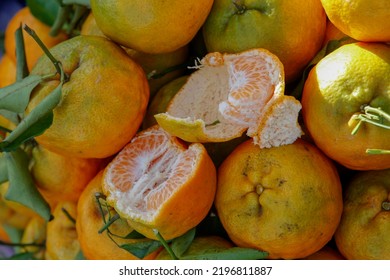 Stack Of Tangerines Exposed In Outdoor Market Stalll. Brazil