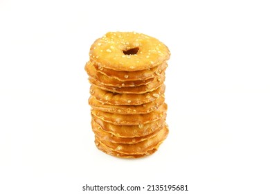 Stack of thin sea salt cracker chips isolated on white background - Shutterstock ID 2135195681
