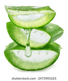 Stack of three aloe vera slices and dropping aloe vera gel, macro shot isolated on white background.