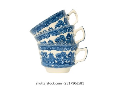 Stack of three blue and white china cups