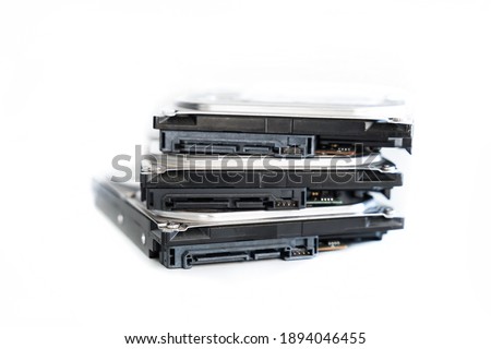 stack of three hdd disks data storage on white isolated background