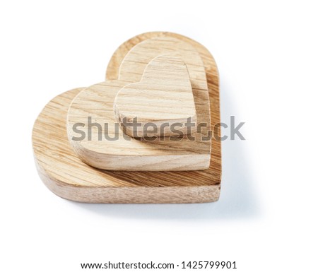 stack of three wooden symbol toys isolated on white