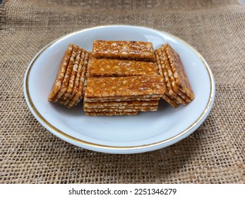 stack of ting ting enting enting indonesian traditional sweet peanut brown sugar candy snack 