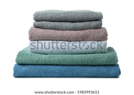Stack of towels isolated on white background
