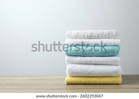 Stack of towels on the table