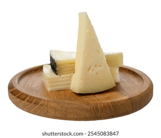 Stack of triangular pieces of cheese on round wooden board, isolated background
