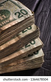 stack of twenty dollar bills