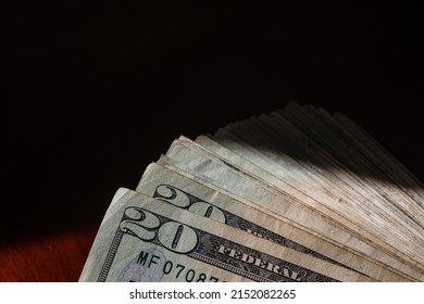 stack of twenty dollars banknotes, close up, front side