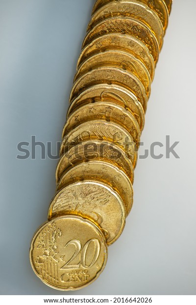 Stack of Twenty Euro Cents Lies on a Gray\
Background. Web Banner.