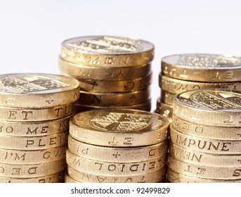 Stack Of UK Coins On White Background