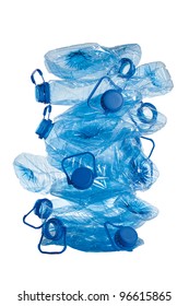 stack of used blue plastic crushed bottles isolated on white background