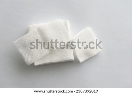 stack of variatio of gauze on white