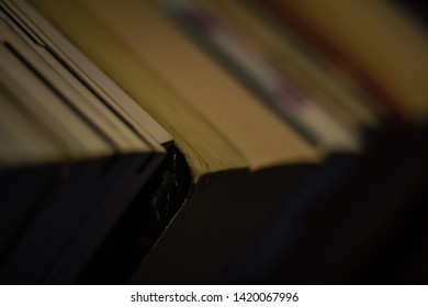A stack of various books. 
