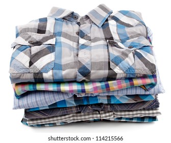 Stack of Various Plaid Men's Shirts isolated on white background