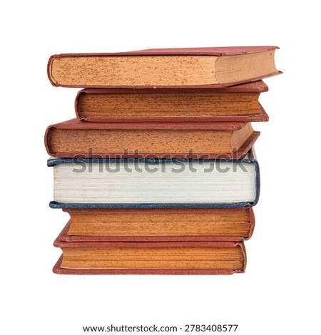Stack of vintage books isolated on white background with clipping path